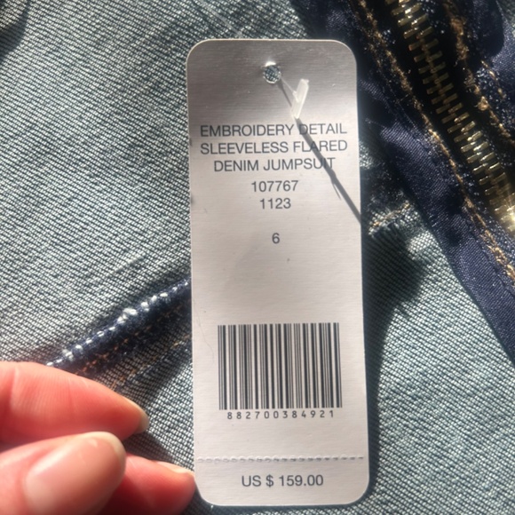 Bebe Embroidery Detail Sleeveless Flared Denim Jumpsuit - Picture 4 of 4